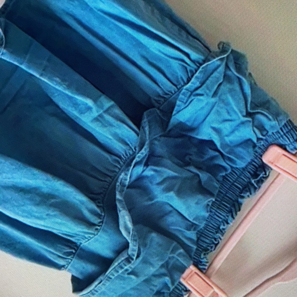 Great preowned condition with floral skirt